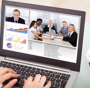 Businesswoman Video Conferencing With Laptop